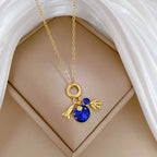 Collier "COSMOS" Astronaute Lune et Planète